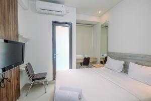 Nice and Cozy Studio at Transpark Cibubur Apartment By Travelio