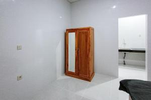 Widi Guest House near GWK Mitra RedDoorz