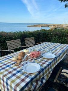 Thatched House With A View Of The Baltic Sea