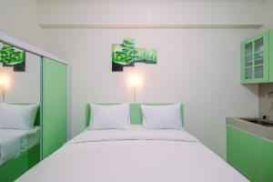 Comfortable and Minimalist Studio at Bogorienze Apartment By Travelio