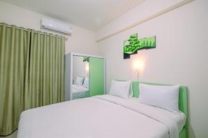 Comfortable and Minimalist Studio at Bogorienze Apartment By Travelio