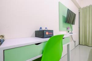 Comfortable and Minimalist Studio at Bogorienze Apartment By Travelio