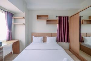 Cozy Stay Studio Apartment at Margonda Residence 5 By Travelio