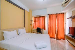 Homey and Simply Studio Room at Margonda Residence 3 Apartment By Travelio