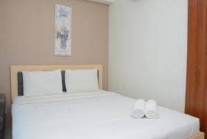 Cozy Living 1BR at Grand Kamala Lagoon Apartment By Travelio