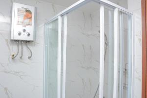 Cozy Living 1BR at Grand Kamala Lagoon Apartment By Travelio