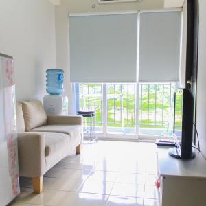 Comfy and Best View 2BR at Serpong Greenview Apartment By Travelio