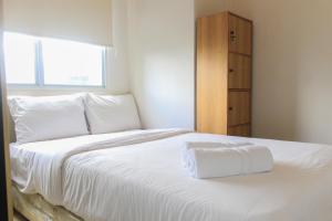 Comfy and Best View 2BR at Serpong Greenview Apartment By Travelio