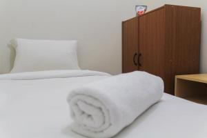 Comfy and Best View 2BR at Serpong Greenview Apartment By Travelio