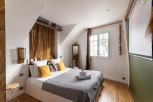 Maisons de vacances La Capsule - Avec jacuzzi : photos des chambres