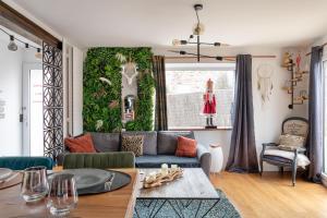 Maisons de vacances La Capsule - Avec jacuzzi : photos des chambres