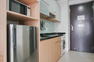 Best Studio with Pool View at Menteng Park Apartment By Travelio