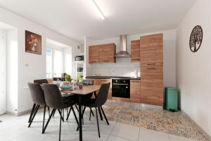 Maisons de vacances La Caulnaise - Maison climatisee avec terrasse : photos des chambres