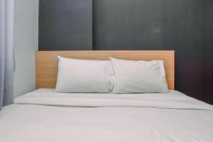 Alluring 2BR at Bassura City Apartment near Mall By Travelio