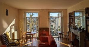 B&B / Chambres d'hotes Au dessus des arcades : photos des chambres