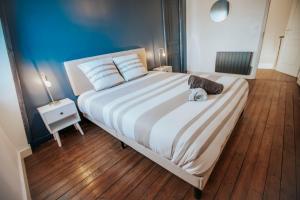Appartements Grand appartement en centre ville : photos des chambres