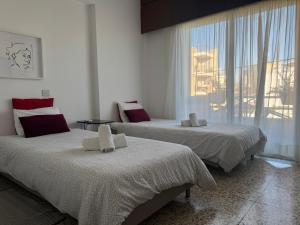 Nikolas and Persefoni Flats