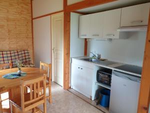 Chalets Camping Fraiteux : photos des chambres