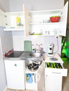 Appartements Grands Studios Maillochon acces Gare de Poitiers et Centre ville a Pieds : photos des chambres