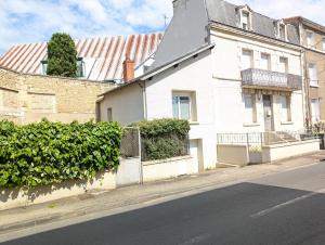 Appartements Grands Studios Maillochon acces Gare de Poitiers et Centre ville a Pieds : photos des chambres