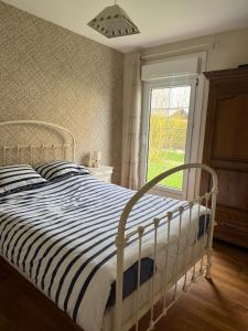 Maisons de vacances Le Rivage, Maison avec jardin proche de la mer : photos des chambres
