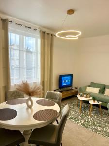 Appartements Escapade Thermale : photos des chambres