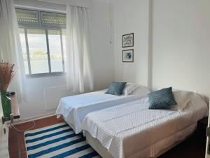 Apartamento pé na areia Guarujá