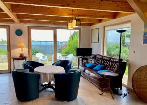 Maisons de vacances House with sea view and large garden for 8 people : photos des chambres