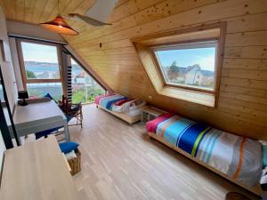 Maisons de vacances House with sea view and large garden for 8 people : photos des chambres