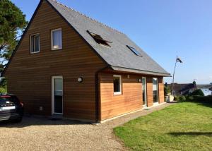 Maisons de vacances House with sea view and large garden for 8 people : photos des chambres