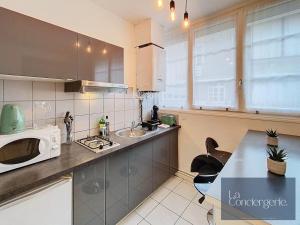 Appartements Le Carmelite - Poitiers Futuroscope - proche gare - LaConciergerie : photos des chambres