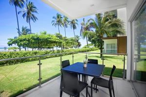 Beachfront Condo - your Oasis with pool and Wi-Fi