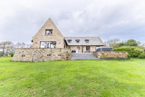 Maisons de vacances KER LAN - Maison de caractere avec SPA et vue mer : photos des chambres