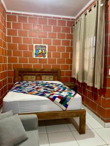 Apto kitnet em condomínio com piscina, em Ubatuba