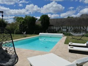 Maisons de vacances Evasion Sologne : Maison de charme, piscine privee, animaux permis - FR-1-590-556 : photos des chambres
