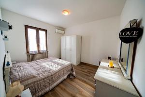 Appartamento a due passi da Gardaland con Wi-Fi veloce e aria condizionata