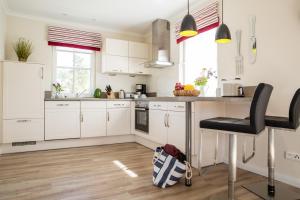 Ferienhaus Schilfrohrsänger 21-Teichperle-