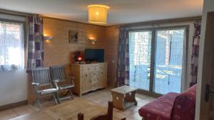 Appartements les 7 laux immobilier chalet A : photos des chambres