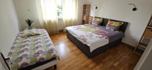 Appartements Superbe logement refait a neuf 3 chambres et double parking : photos des chambres