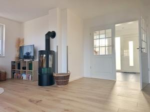 Reethaus "MeerZeit" mit Kamin, Sauna und 3 Schlafzimmern