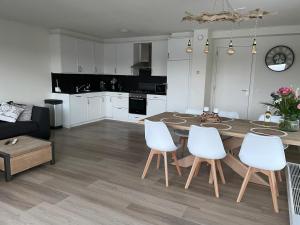 Luxe watervilla met eigen aanlegsteiger geschikt voor maximaal 6 personen in recreatiegebied de Gouden Ham in Maasbommel