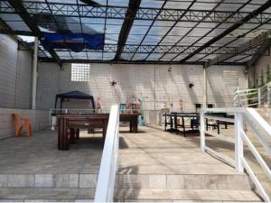Apartamento térreo pé na areia