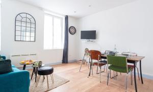 Appartements Tous a la Plage Lit King Size : photos des chambres