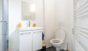 Appartements Tous a la Plage Lit King Size : photos des chambres