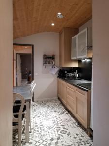Appartements Maison Centre Ville Parking prive : photos des chambres