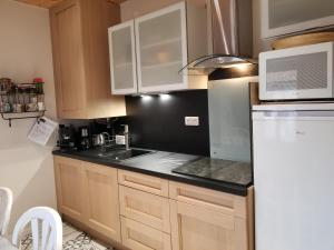 Appartements Maison Centre Ville Parking prive : photos des chambres