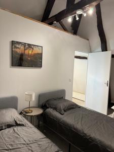 Maisons de vacances La ferme d-Hareauville - Heated swimming pool : photos des chambres