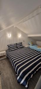 Maisons de vacances Studio mezzanine a proximite du parc Disneyland : photos des chambres