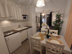 Appartements La terrasse de l'Imbut - Climatisation & Piscine : photos des chambres