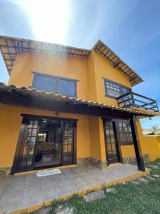 La casa di Helena É Aquela casa pé N areia